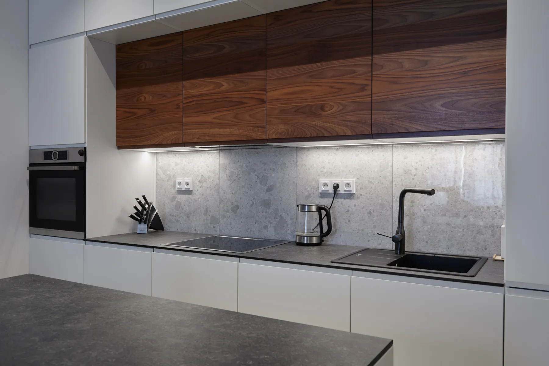 Kitchen detail – walnut veneer and LED under-cabinet lighting